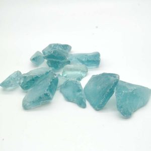 New made slightly tumbled sky blue glass stones